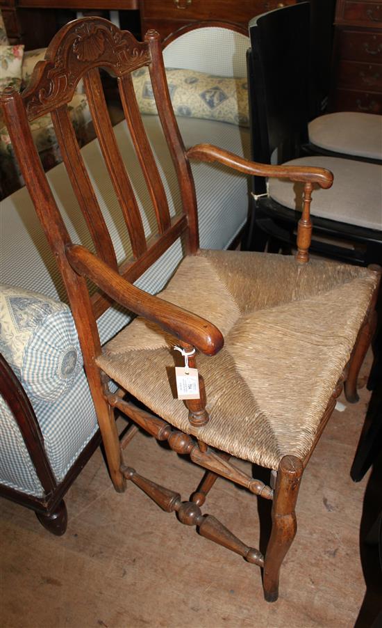 19th century French beech and fruitwood elbow chair(-)